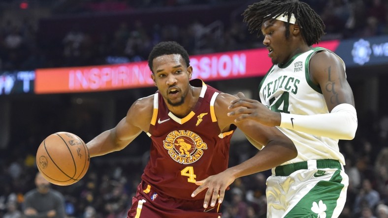 Nov 15, 2021; Cleveland, Ohio, USA; Cleveland Cavaliers center Evan Mobley (4) drives against Boston Celtics center Robert Williams III (44) in the second quarter at Rocket Mortgage FieldHouse. Mandatory Credit: David Richard-USA TODAY Sports