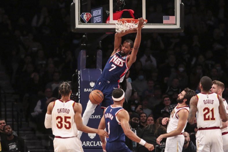 Nov 17, 2021; Brooklyn, New York, USA; Brooklyn Nets forward Kevin Durant (7) dunks in the first quarter against the Cleveland Cavaliers at Barclays Center. Mandatory Credit: Wendell Cruz-USA TODAY Sports