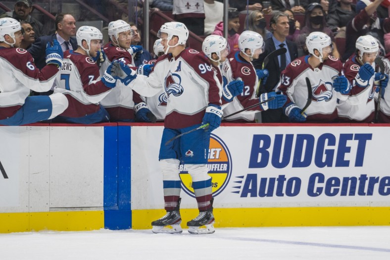Nov 17, 2021; Vancouver, British Columbia, CAN; Colorado Avalanche forward Mikko Rantanen (96) celebrates his goal against the Vancouver Canucks in the first period at Rogers Arena. Mandatory Credit: Bob Frid-USA TODAY Sports