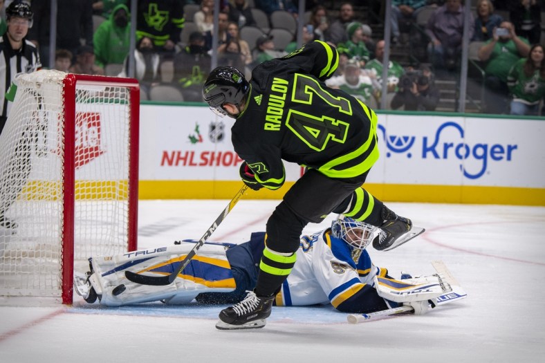 Nov 20, 2021; Dallas, Texas, USA; St. Louis Blues goaltender Jordan Binnington (50) makes a pad save on a penalty shot by Dallas Stars right wing Alexander Radulov (47) during the second period at the American Airlines Center. Mandatory Credit: Jerome Miron-USA TODAY Sports