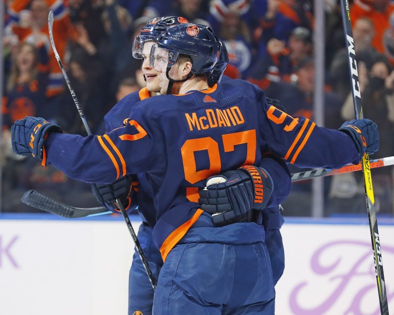 Nov 20, 2021; Edmonton, Alberta, CAN; Edmonton Oilers forward Connor McDavid (97) celebrates after a first period goal against the Chicago Blackhawks at Rogers Place. Mandatory Credit: Perry Nelson-USA TODAY Sports