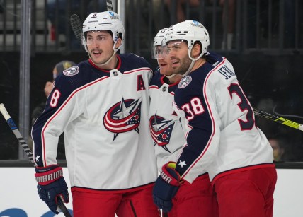 Nov 20, 2021; Las Vegas, Nevada, USA;  Columbus Blue Jackets center Gustav Nyquist (14) celebrates with Columbus Blue Jackets defenseman Zach Werenski (8) and Columbus Blue Jackets center Boone Jenner (38) after scoring a first period goal against the Vegas Golden Knights at T-Mobile Arena. Mandatory Credit: Stephen R. Sylvanie-USA TODAY Sports