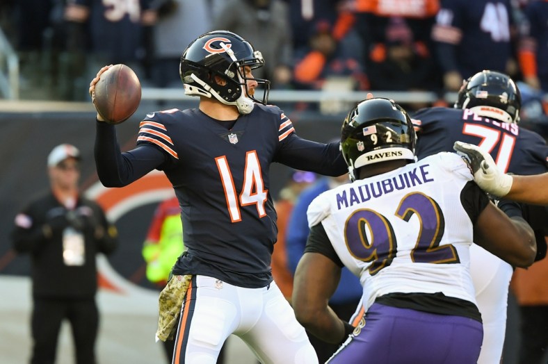 Nov 21, 2021; Chicago, Illinois, USA; Chicago Bears quarterback Andy Dalton (14) passes in the second half against the Baltimore Ravens at Soldier Field. Mandatory Credit: Quinn Harris-USA TODAY Sports