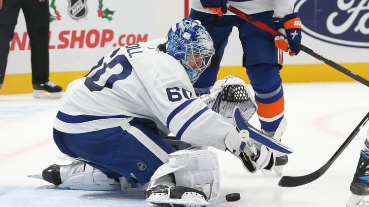 Nov 21, 2021; Elmont, New York, USA; Toronto Maple Leafs goaltender Joseph Woll (60) makes a kick save against New York Islanders during the second period at UBS Arena. Mandatory Credit: Tom Horak-USA TODAY Sports