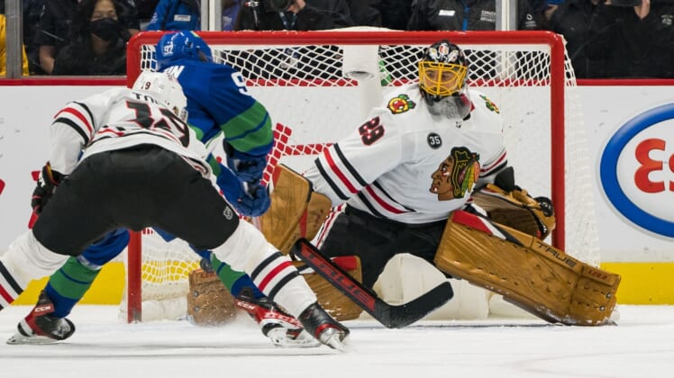 Nov 21, 2021; Vancouver, British Columbia, CAN; Chicago Blackhawks goalie Marc-Andre Fleury (29) makes a save on Vancouver Canucks forward Vasily Podkolzin (92) in the second period at Rogers Arena. Mandatory Credit: Bob Frid-USA TODAY Sports