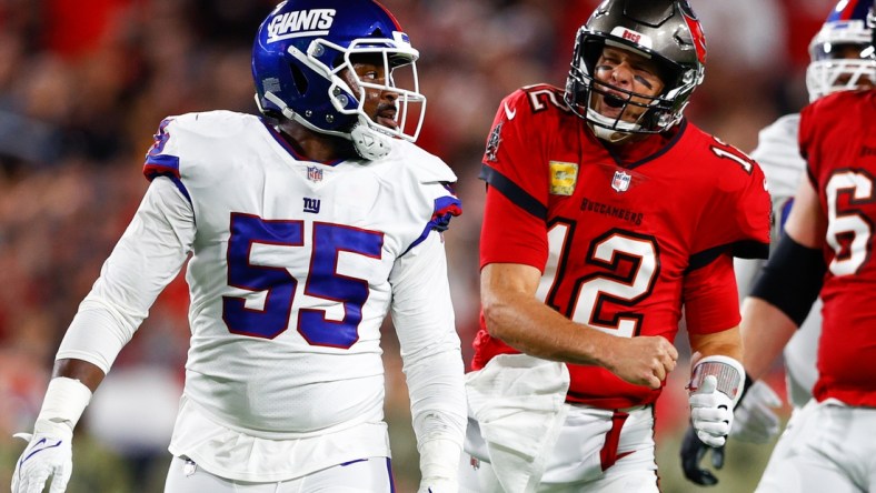 Nov 22, 2021; Tampa, Florida, USA;  Tampa Bay Buccaneers quarterback Tom Brady (12) reacts alert a run in the first half against the New York Giants at Raymond James Stadium. Mandatory Credit: Nathan Ray Seebeck-USA TODAY Sports