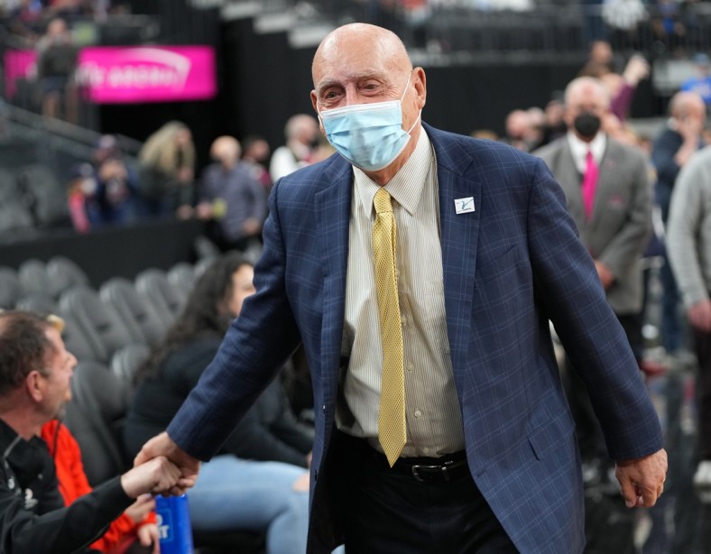 Nov 23, 2021; Las Vegas, Nevada, USA; College basketball commentator Dick Vitale greets fans as he makes his return to work a game between the Gonzaga Bulldogs and the UCLA Bruins at T-Mobile Arena. Mandatory Credit: Stephen R. Sylvanie-USA TODAY Sports
