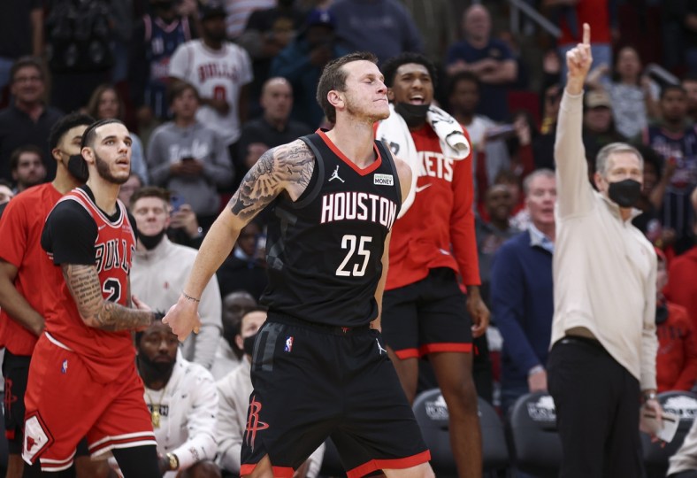 Nov 24, 2021; Houston, Texas, USA; Houston Rockets guard Garrison Mathews (25) reacts after making a basket during the fourth quarter against the Chicago Bulls at Toyota Center. Mandatory Credit: Troy Taormina-USA TODAY Sports