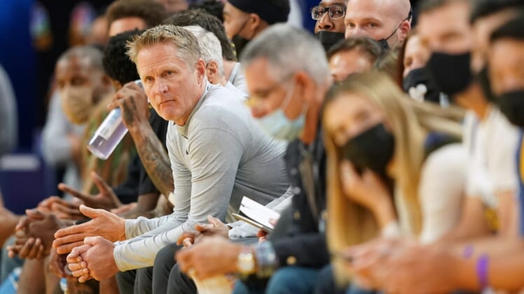 Nov 26, 2021; San Francisco, California, USA; Golden State Warriors head coach Steve Kerr sits on the bench during the fourth quarter against the Portland Trail Blazers at Chase Center. Mandatory Credit: Darren Yamashita-USA TODAY Sports