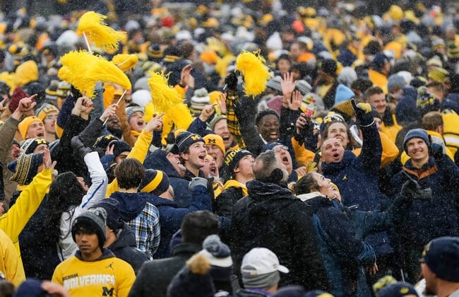 Michigan fans rush the field after the Wolverines defeat Ohio State 42-27 at Michigan Stadium in Ann Arbor on Nov. 27, 2021.Secondary 11272021 Umosu2h 47