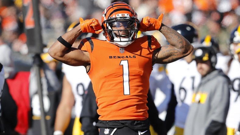 Nov 28, 2021; Cincinnati, Ohio, USA; Cincinnati Bengals wide receiver Ja'Marr Chase (1) celebrates the first down during the first quarter against the Pittsburgh Steelers at Paul Brown Stadium. Mandatory Credit: Joseph Maiorana-USA TODAY Sports