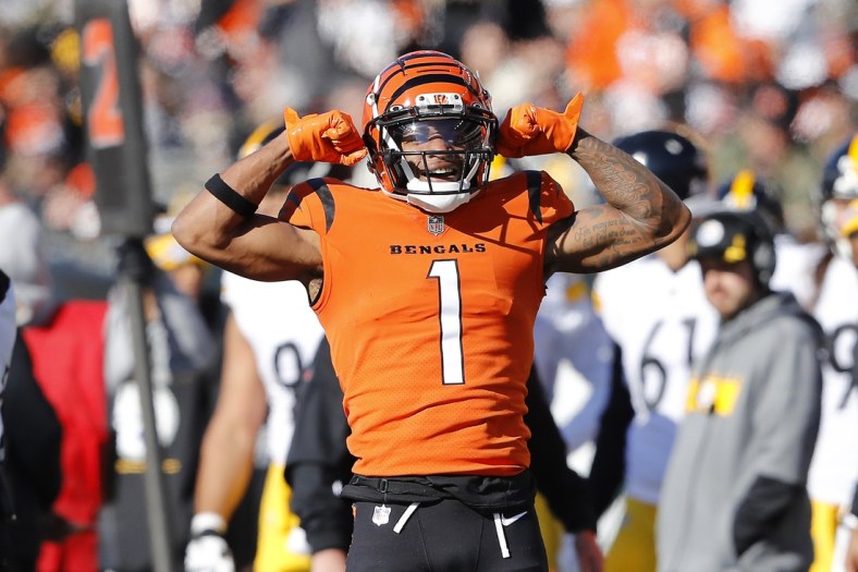 Nov 28, 2021; Cincinnati, Ohio, USA; Cincinnati Bengals wide receiver Ja'Marr Chase (1) celebrates the first down during the first quarter against the Pittsburgh Steelers at Paul Brown Stadium. Mandatory Credit: Joseph Maiorana-USA TODAY Sports