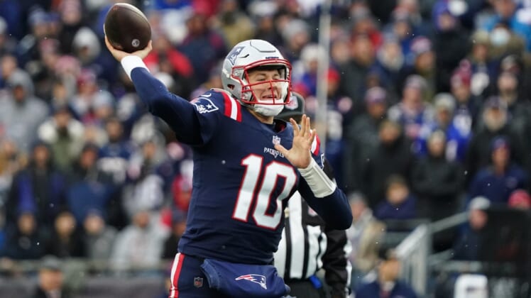 Nov 28, 2021; Foxborough, Massachusetts, USA; New England Patriots quarterback Mac Jones (10) throws a pass against the Tennessee Titans in the second quarter at Gillette Stadium. Mandatory Credit: David Butler II-USA TODAY Sports