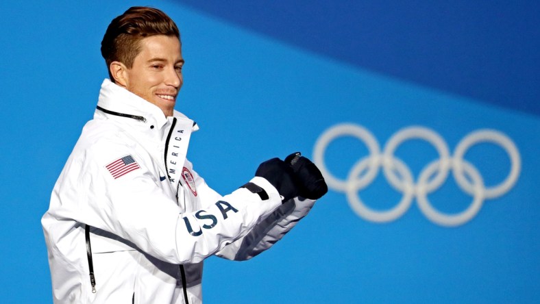 Feb 14, 2018; Pyeongchang, South Korea; Shaun White of the United States celebrates winning gold during the medals ceremony for the Men's Snowboard Halfpipe in the Pyeongchang 2018 Olympic Winter Games at Medals Plaza. Mandatory Credit: Soobum Im-USA TODAY Sports