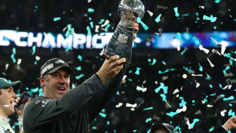 Feb 4, 2018; Minneapolis, MN, USA; Philadelphia Eagles head coach Doug Pederson hoist the Vince Lombardi Trophy after a victory against the New England Patriots in Super Bowl LII at U.S. Bank Stadium. Mandatory Credit: Matthew Emmons-USA TODAY Sports