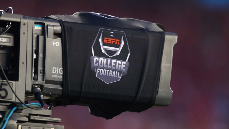 Aug 31, 2018; Madison, WI, USA; ESPN College Football logo on a tv camera prior to the game between the Western Kentucky Hilltoppers and Wisconsin Badgers at Camp Randall Stadium. Mandatory Credit: Jeff Hanisch-USA TODAY Sports