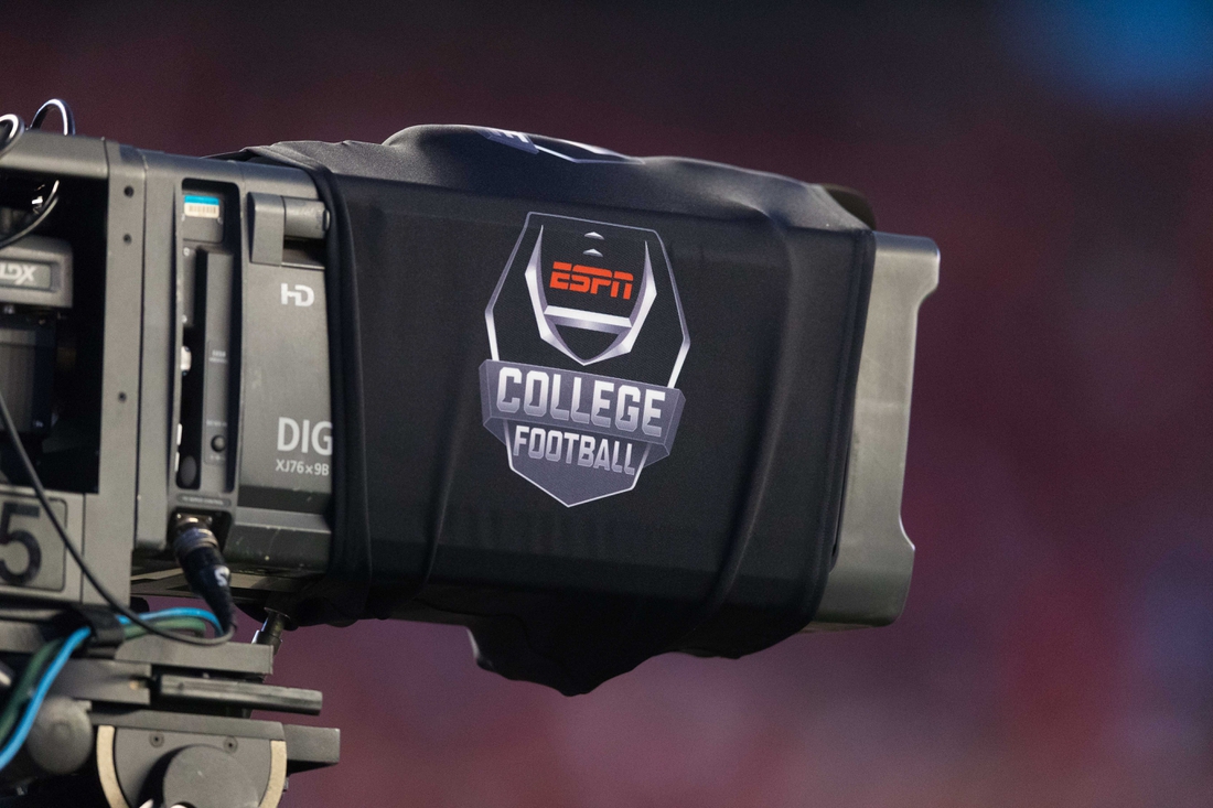 Aug 31, 2018; Madison, WI, USA; ESPN College Football logo on a tv camera prior to the game between the Western Kentucky Hilltoppers and Wisconsin Badgers at Camp Randall Stadium. Mandatory Credit: Jeff Hanisch-USA TODAY Sports