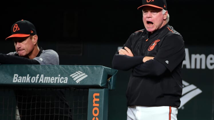 Sep 14, 2018; Baltimore, MD, USA; Baltimore Orioles manager Buck Showalter (right) reacts after a strikeout in the ninth inning against the Chicago White Sox at Oriole Park at Camden Yards. Mandatory Credit: Evan Habeeb-USA TODAY Sports