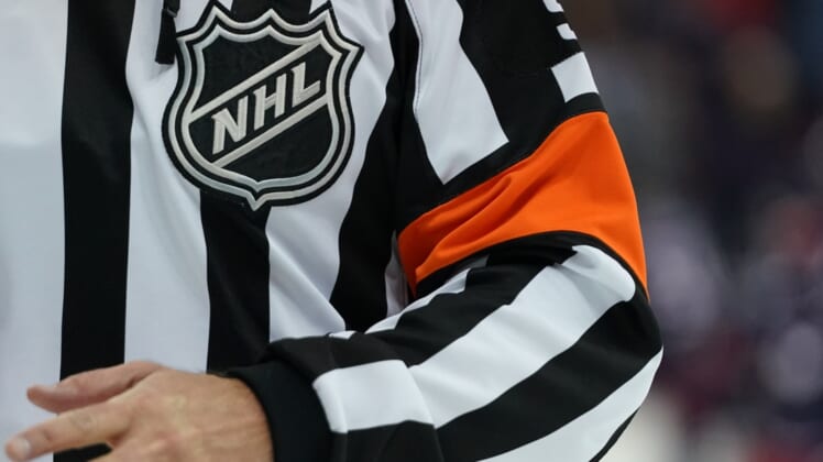 Oct 20, 2018; Columbus, OH, USA; A view of the NHL shield logo on the jersey of an official in the game of the Chicago Blackhawks against the Columbus Blue Jackets at Nationwide Arena. Mandatory Credit: Aaron Doster-USA TODAY Sports