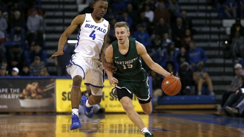 Nov 21, 2018; Buffalo, NY, USA; Buffalo Bulls guard Davonta Jordan (4) looks to steal the ball from Dartmouth Big Green guard Brendan Barry (15) as he goes up the court during the second half at Alumni Arena. Mandatory Credit: Timothy T. Ludwig-USA TODAY Sports