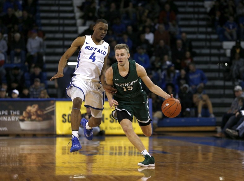 Nov 21, 2018; Buffalo, NY, USA; Buffalo Bulls guard Davonta Jordan (4) looks to steal the ball from Dartmouth Big Green guard Brendan Barry (15) as he goes up the court during the second half at Alumni Arena. Mandatory Credit: Timothy T. Ludwig-USA TODAY Sports