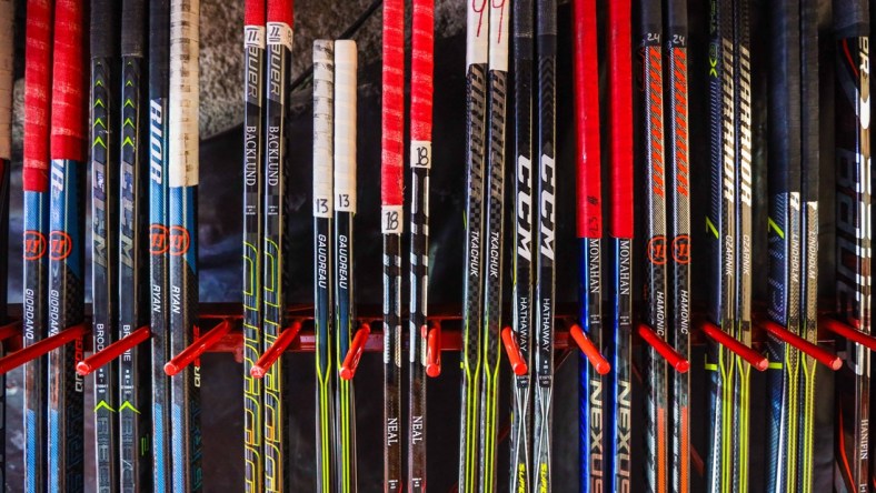 Mar 27, 2019; Calgary, Alberta, CAN; A general view of Calgary Flames hockey sticks during warm ups prior to the game against the Dallas Stars at Scotiabank Saddledome. Mandatory Credit: Sergei Belski-USA TODAY Sports