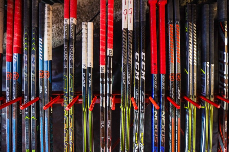 Mar 27, 2019; Calgary, Alberta, CAN; A general view of Calgary Flames hockey sticks during warm ups prior to the game against the Dallas Stars at Scotiabank Saddledome. Mandatory Credit: Sergei Belski-USA TODAY Sports