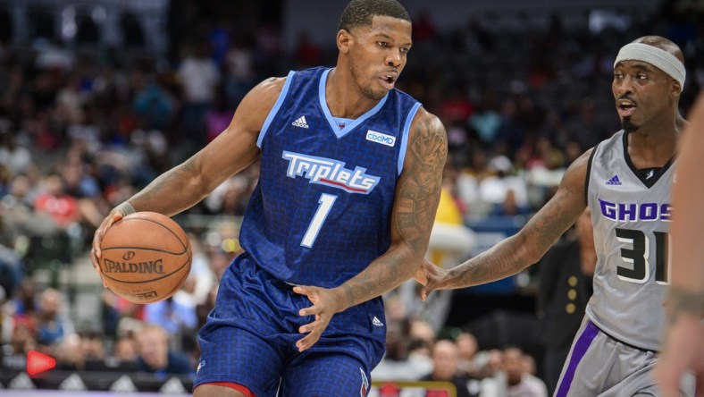 Aug 17, 2019; Dallas, TX, USA; Triplets forward Joe Johnson (1) and Ghost Ballers forward Ricky Davis (31) during the game at the American Airlines Center. Mandatory Credit: Jerome Miron-USA TODAY Sports