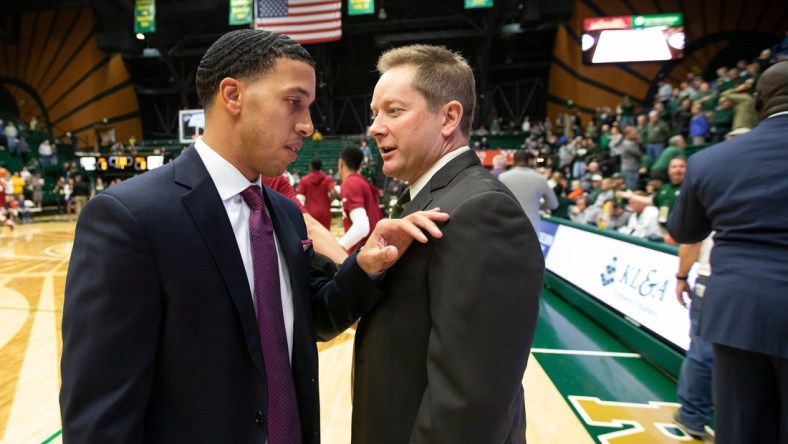 Colorado State University head coach Niko Medved, right and University of Denver head coach Rodney Billups meet before a game on Tuesday Nov. 5, 2019, at Moby Arena in Fort Collins, Colo.

Csuvdubskb 20191105 Th