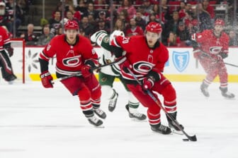 Dec 7, 2019; Raleigh, NC, USA;  Carolina Hurricanes center Sebastian Aho (20) skates up the ice with the puck with left wing Teuvo Teravainen (86) against the Minnesota Wild at PNC Arena. The Carolina Hurricanes defeated the Minnesota Wild 6-2. Mandatory Credit: James Guillory-USA TODAY Sports