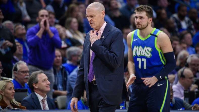 Jan 8, 2020; Dallas, Texas, USA; Dallas Mavericks head coach Rick Carlisle and forward Luka Doncic (77) react to a call during the second half against the Dallas Mavericks at the American Airlines Center. Mandatory Credit: Jerome Miron-USA TODAY Sports