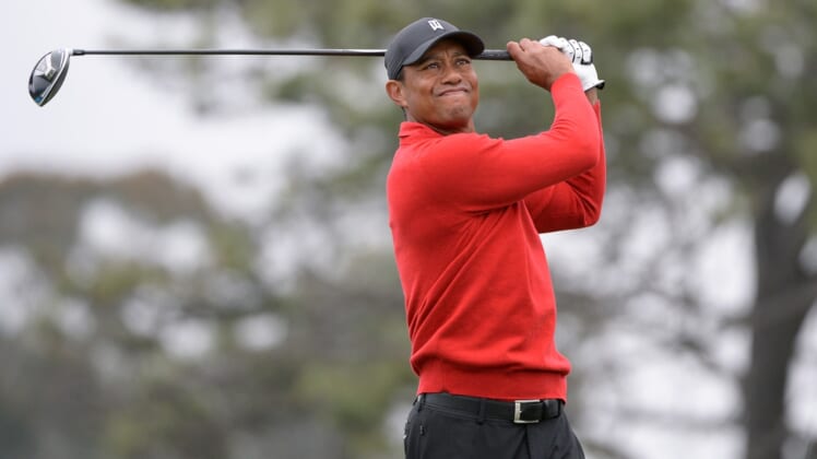 Jan 26, 2020; San Diego, California, USA; Tiger Woods plays his shot from the fifth tee during the final round of the Farmers Insurance Open golf tournament at Torrey Pines Municipal Golf Course - South Co. Mandatory Credit: Orlando Ramirez-USA TODAY Sports