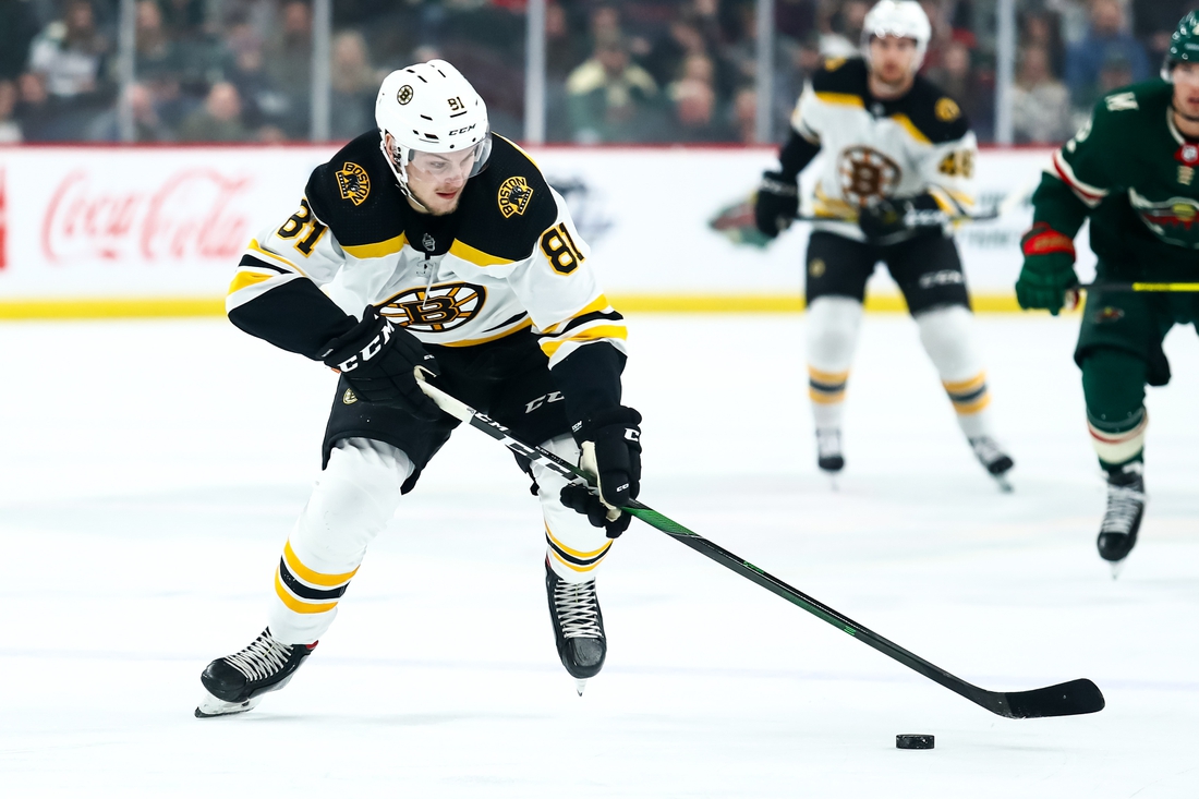 Feb 1, 2020; Saint Paul, Minnesota, USA; Boston Bruins left wing Anton Blidh (81) skates with the puck against the Minnesota Wild in the first period at Xcel Energy Center. Mandatory Credit: David Berding-USA TODAY Sports