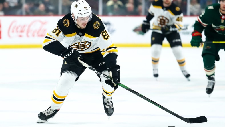 Feb 1, 2020; Saint Paul, Minnesota, USA; Boston Bruins left wing Anton Blidh (81) skates with the puck against the Minnesota Wild in the first period at Xcel Energy Center. Mandatory Credit: David Berding-USA TODAY Sports