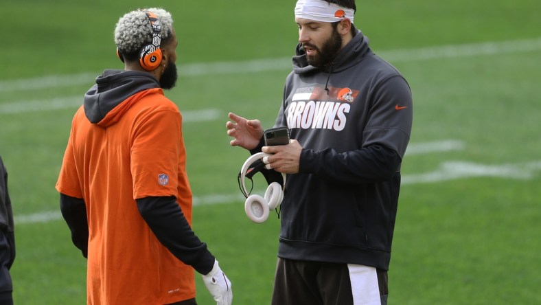 Oct 18, 2020; Pittsburgh, Pennsylvania, USA;  Cleveland Browns wide receiver Odell Beckham Jr. (left) and quarterback Baker Mayfield (right) talk on the field before playing the Pittsburgh Steelers at Heinz Field. Mandatory Credit: Charles LeClaire-USA TODAY Sports