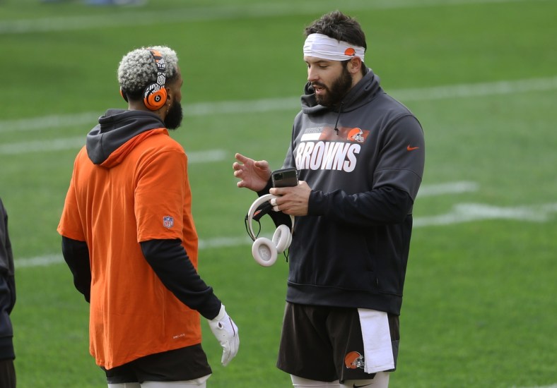 Oct 18, 2020; Pittsburgh, Pennsylvania, USA;  Cleveland Browns wide receiver Odell Beckham Jr. (left) and quarterback Baker Mayfield (right) talk on the field before playing the Pittsburgh Steelers at Heinz Field. Mandatory Credit: Charles LeClaire-USA TODAY Sports