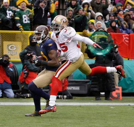 Green Bay Packers wide receiver Greg Jennings (85) strides into the end zone past San Francisco 49ers cornerback Phillip Adams (35) to score a touchdown in the second  half of a 34-16 Packers win at Lambeau Field on Dec. 5, 2010.

Packers06 03 Ofx Wood