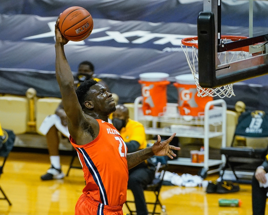 Dec 12, 2020; Columbia, Missouri, USA; Illinois Fighting Illini center Kofi Cockburn (21) dunks Missouri Tigers during the first half at Mizzou Arena. Mandatory Credit: Jay Biggerstaff-USA TODAY Sports