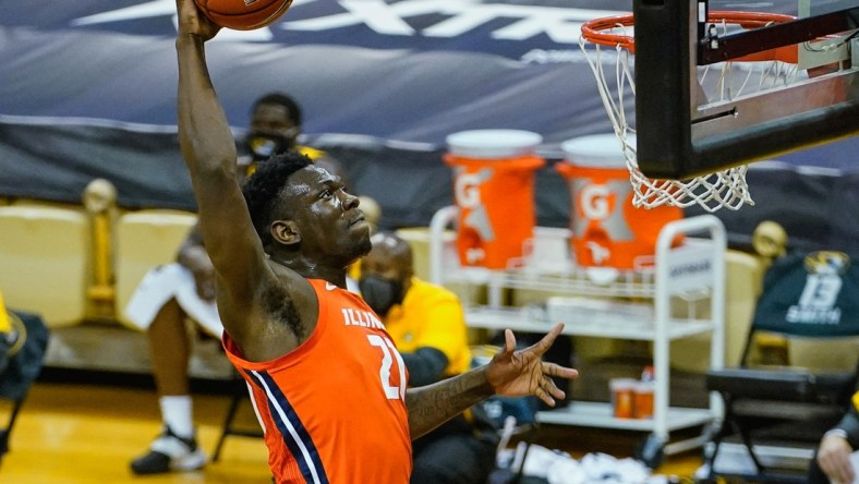 Dec 12, 2020; Columbia, Missouri, USA; Illinois Fighting Illini center Kofi Cockburn (21) dunks Missouri Tigers during the first half at Mizzou Arena. Mandatory Credit: Jay Biggerstaff-USA TODAY Sports