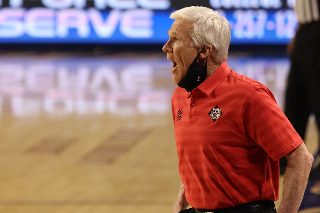 Mar 5, 2021; Richmond, Virginia, USA; Davidson Wildcats head coach Bob McKillop yells to his team from the bench against the George Mason Patriots in the first half of a quarterfinal in the Atlantic 10 conference tournament at Robins Center. Mandatory Credit: Geoff Burke-USA TODAY Sports