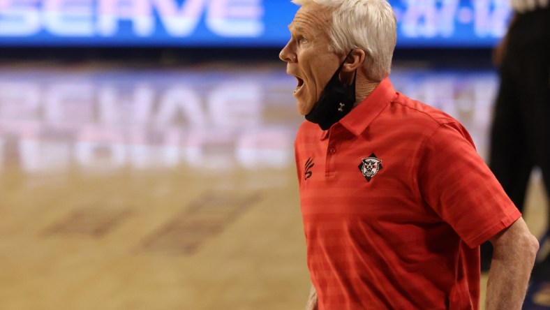 Mar 5, 2021; Richmond, Virginia, USA; Davidson Wildcats head coach Bob McKillop yells to his team from the bench against the George Mason Patriots in the first half of a quarterfinal in the Atlantic 10 conference tournament at Robins Center. Mandatory Credit: Geoff Burke-USA TODAY Sports