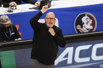 Mar 9, 2021; Greensboro, North Carolina, USA; Wake Forest Demon Deacons head coach Steve Forbes directs his team against the Notre Dame Fighting Irish in the first round of the 2021 ACC men's basketball tournament at Greensboro Coliseum. Mandatory Credit: Nell Redmond-USA TODAY Sports