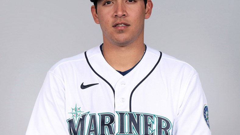 Mar 1, 2021; Peoria, AZ, USA; Seattle Mariners  Andres Munoz #54 poses during media day at the Peoria Sports Complex. Mandatory Credit: MLB photos via USA TODAY Sports