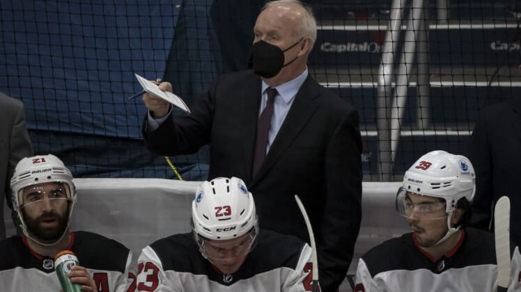 Mar 25, 2021; Washington, District of Columbia, USA; New Jersey Devils head coach Lindy Ruff looks on during the first period of the game against the Washington Capitals at Capital One Arena. Mandatory Credit: Scott Taetsch-USA TODAY Sports