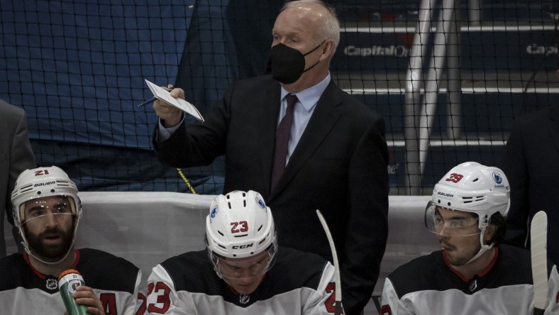 Mar 25, 2021; Washington, District of Columbia, USA; New Jersey Devils head coach Lindy Ruff looks on during the first period of the game against the Washington Capitals at Capital One Arena. Mandatory Credit: Scott Taetsch-USA TODAY Sports