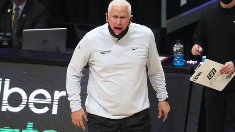 Mar 29, 2021; Indianapolis, Indiana, USA; Oregon State Beavers head coach Wayne Tinkle yells from the sidelines during the second half in the Elite Eight of the 2021 NCAA Tournament against the Houston Cougars at Lucas Oil Stadium. Mandatory Credit: Mark J. Rebilas-USA TODAY Sports