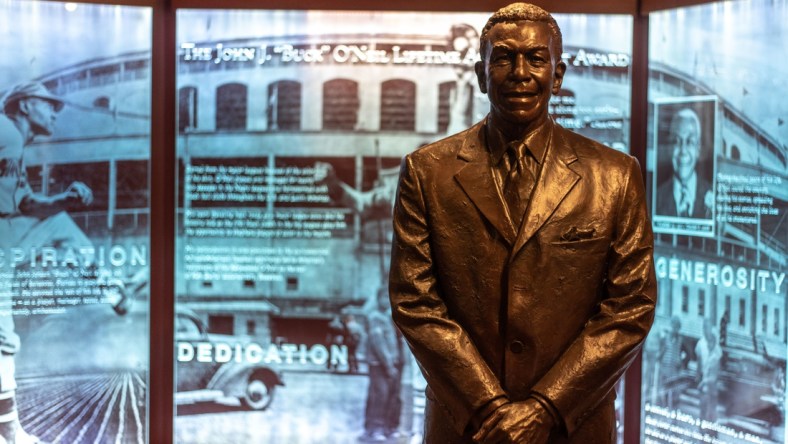 An exhibit at the National Baseball Hall of Fame in Cooperstown, Otsego County, shows a statue of John "Buck" O'Neil, who was a first baseman and manager in the Negro league, mostly with the Kansas City Monarchs. He later became the first Black person to coach a Major League team. Thursday, March 18, 2021.

baseball hall negro league exhibit