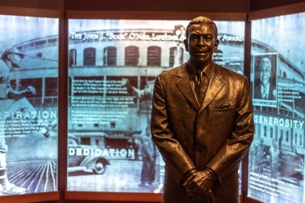 An exhibit at the National Baseball Hall of Fame in Cooperstown, Otsego County, shows a statue of John "Buck" O'Neil, who was a first baseman and manager in the Negro league, mostly with the Kansas City Monarchs. He later became the first Black person to coach a Major League team. Thursday, March 18, 2021.

baseball hall negro league exhibit