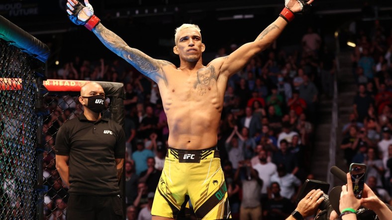 May 15, 2021; Houston, Texas, USA; Charles Oliveira reacts for his fight against Michael Chandler during UFC 262 at Toyota Center. Mandatory Credit: Troy Taormina-USA TODAY Sports