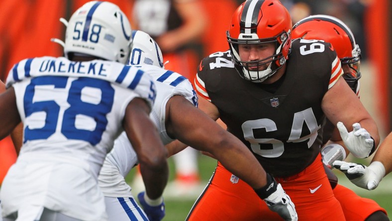 Browns center JC Tretter (64) blocks for Baker Mayfield during the first quarter against the Indianapolis Colts, Sunday, Oct. 11, 2020, in Cleveland, Ohio. [Jeff Lange/Beacon Journal]

BrownsTretter